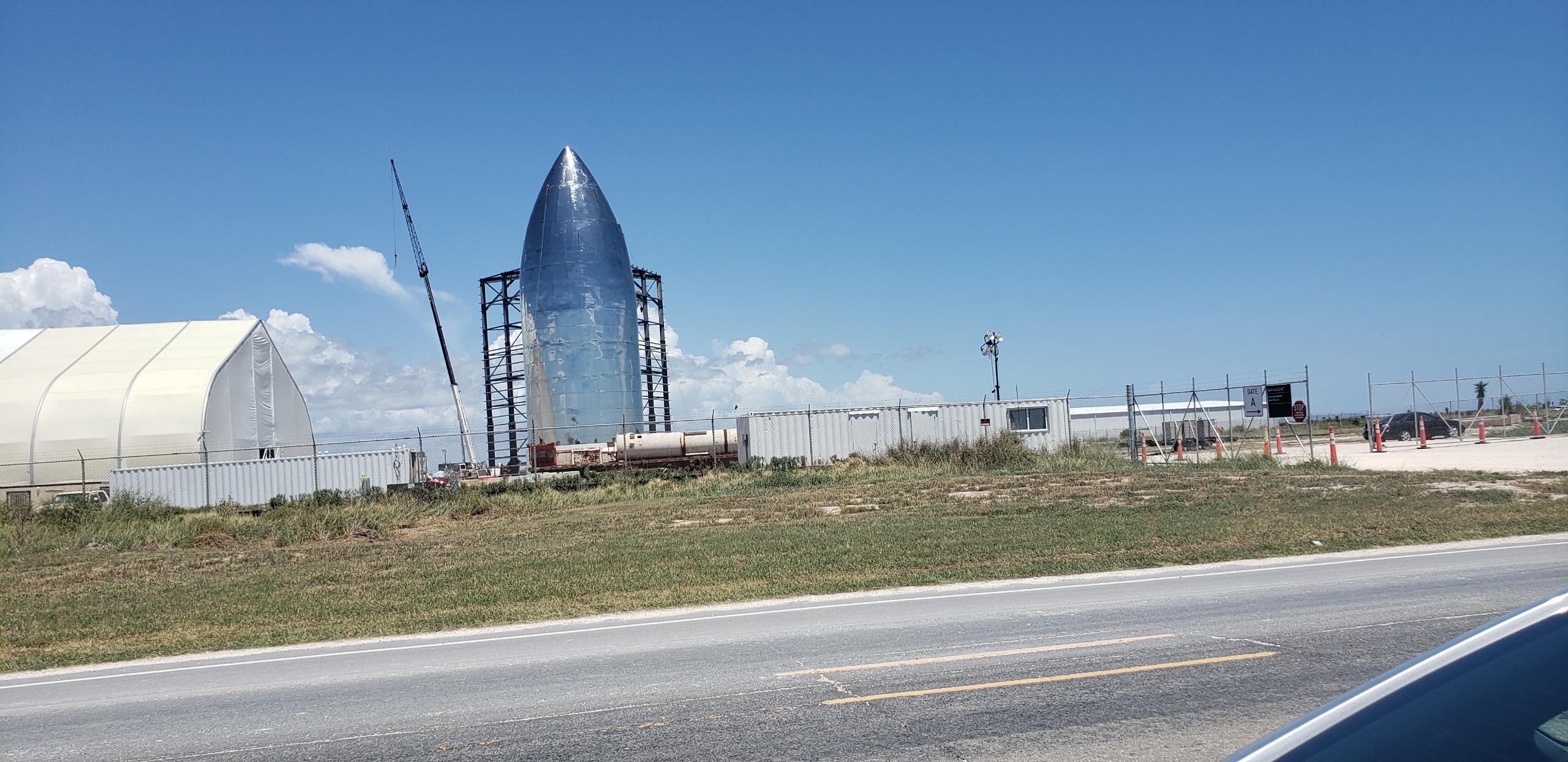Existing SpaceX facilities constructed along State Highway 4 at the Gulf of Mexico within the Palmito Ranch Battlefield National Historic Landmark site. Photo: Melissa Currie, August 2019.
